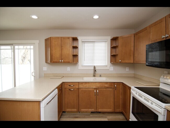 Building Photo - Beautifully Remodeled Home with Two Car Garage and Large Backyard!