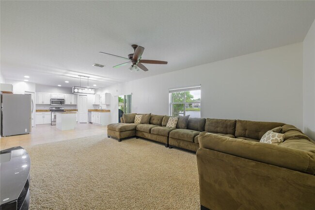 Building Photo - 6147 NW Butterfly Orchid Pl