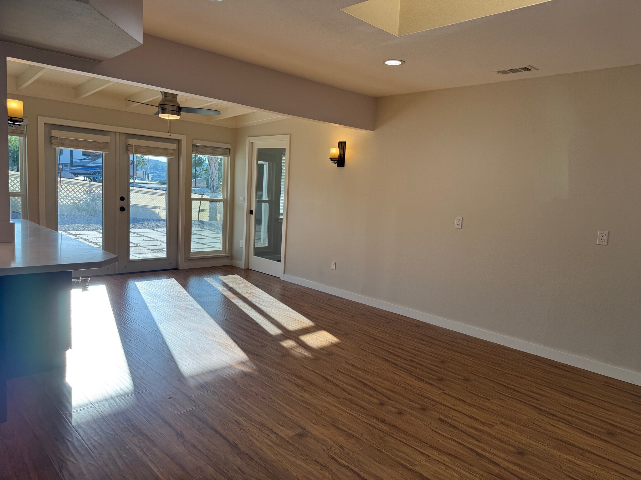 Dining room has skylight and beautiful french doors to back yard. Tons of light. - 22471 Loch Lomond Dr