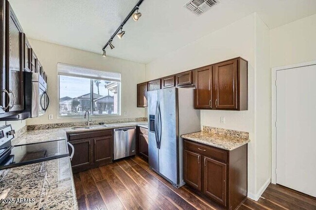 Building Photo - 15436 W Port Royale Ln