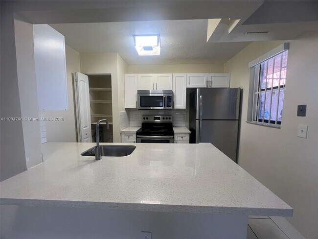 Building Photo - 6560 W 27th Ct