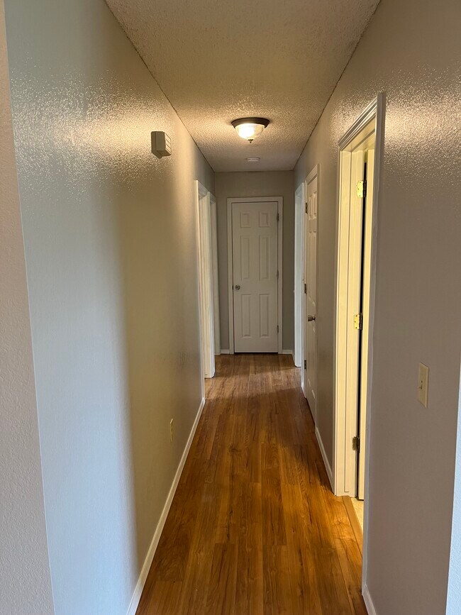 Hallway to bedrooms - 1004 S Dogwood St