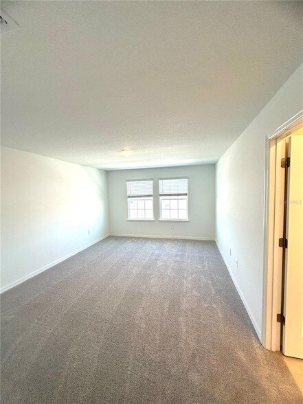 Building Photo - 8795 Coqui Song Ln