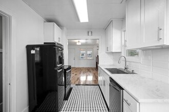 Building Photo - Remodeled 3BR/2BA Brick Bungalow - Fireplace, Finished Basement & Garage