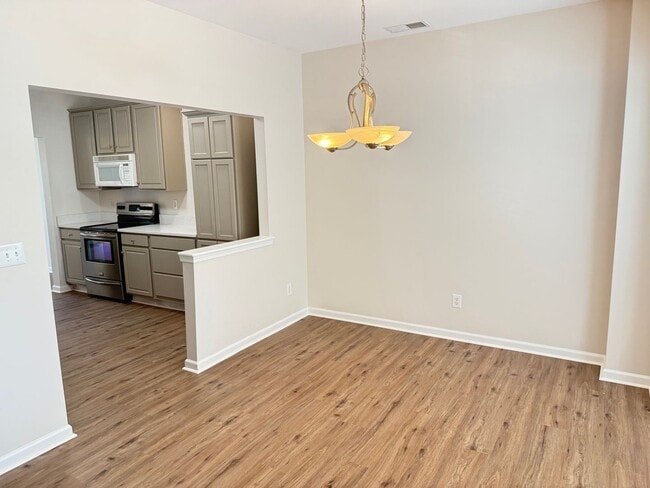 Building Photo - Renovated Cornelius Townhome with Garage, Pool & Elevated Rear Deck