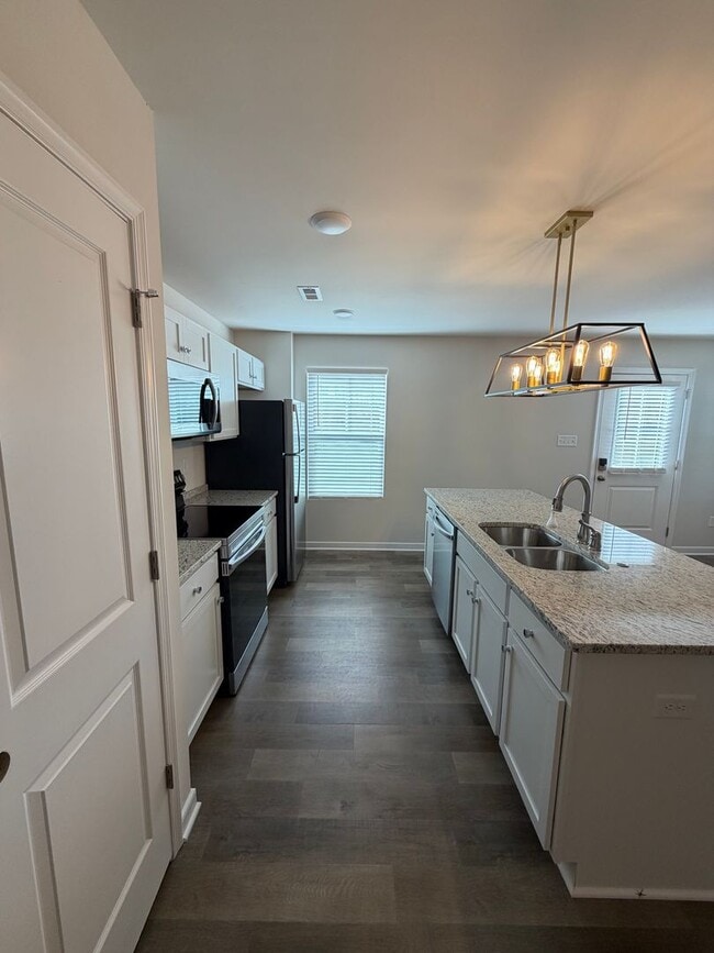 Building Photo - Modern Two-Story Townhome with Open Floor Plan and Garage