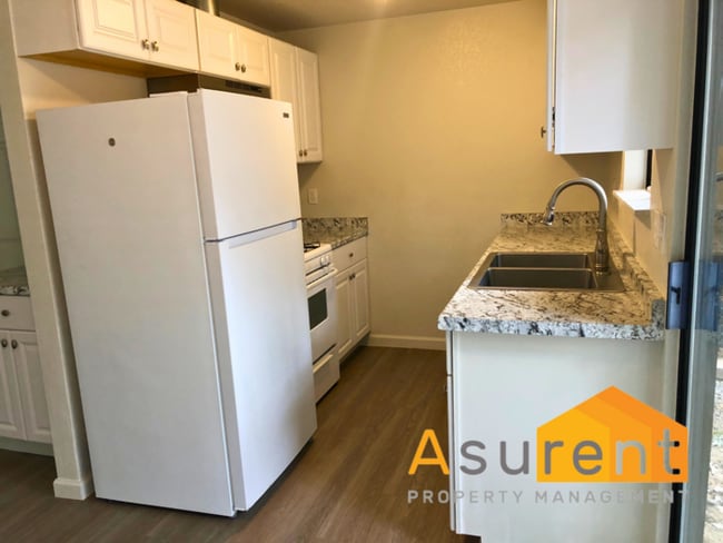 Building Photo - $200 off first months rent. Fully Remodele...