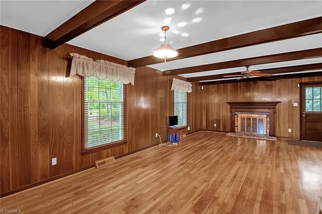 Building Photo - Earn Wealth While Leasing - Like a Homeown...
