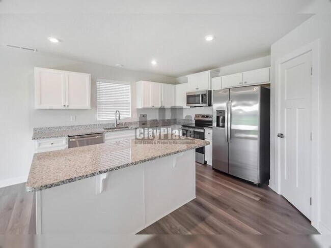Building Photo - 7009 E Bean Blossom Dr