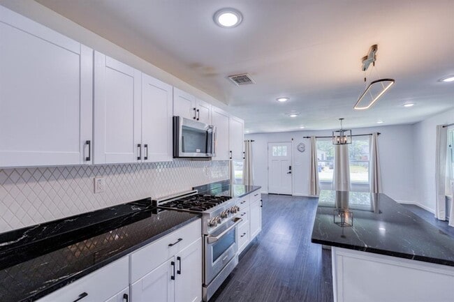 Building Photo - 6202 Carnation Terrace