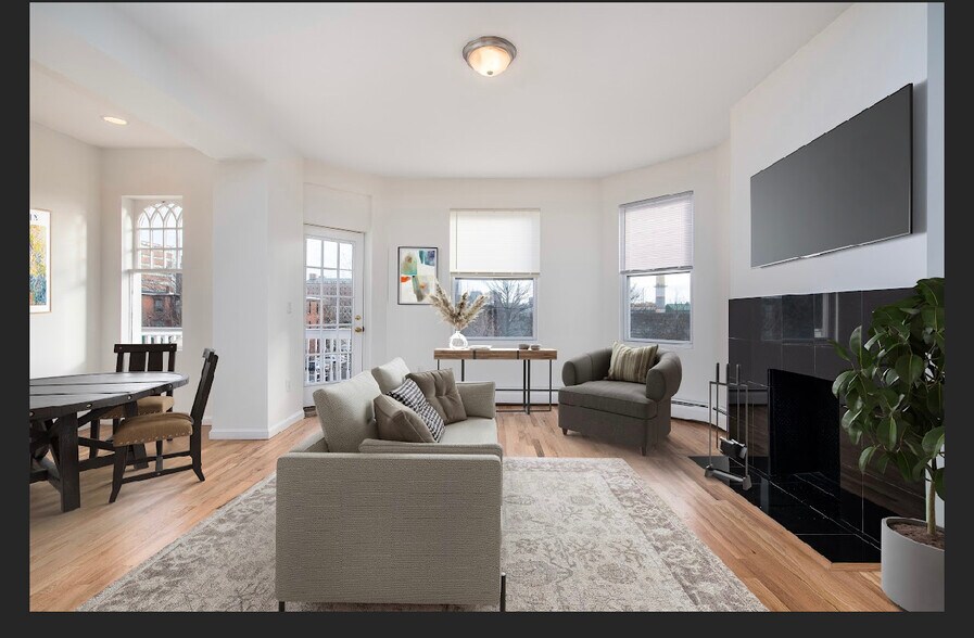 Living room with fireplace (staged) - 15 Imlay St