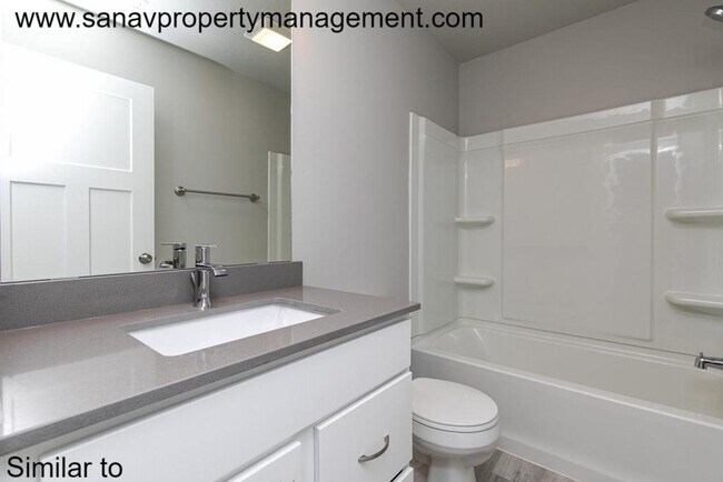Building Photo - Stunning 4-Bedroom Home with Finished Base...