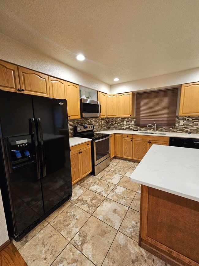 Building Photo - 4 BED | 2 BATH | DOUBLE GARAGE | PET NEGOT...