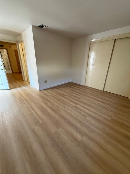 back bedroom with door to outside and en suite bathroom - 25 W Monterey Ave