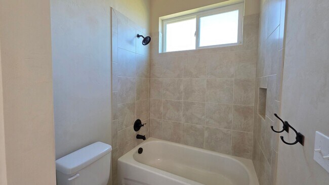 Building Photo - FOR RENT 4 BEDROOM 3 BATHROOM HOME