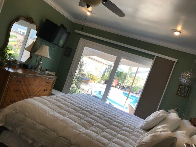 View from master bedroom with California King Size Bed. - 3822 Berryman Ave