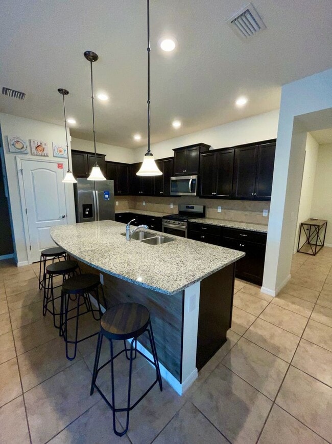 Building Photo - Spacious 5-Bed / 4.5-Bath Townhome w/ Private Pool & Sundeck in Gated Oakmont at Solterra Near Di...