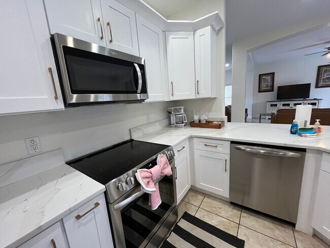 Building Photo - Beautiful Mediterranean Pool Home Availabl...
