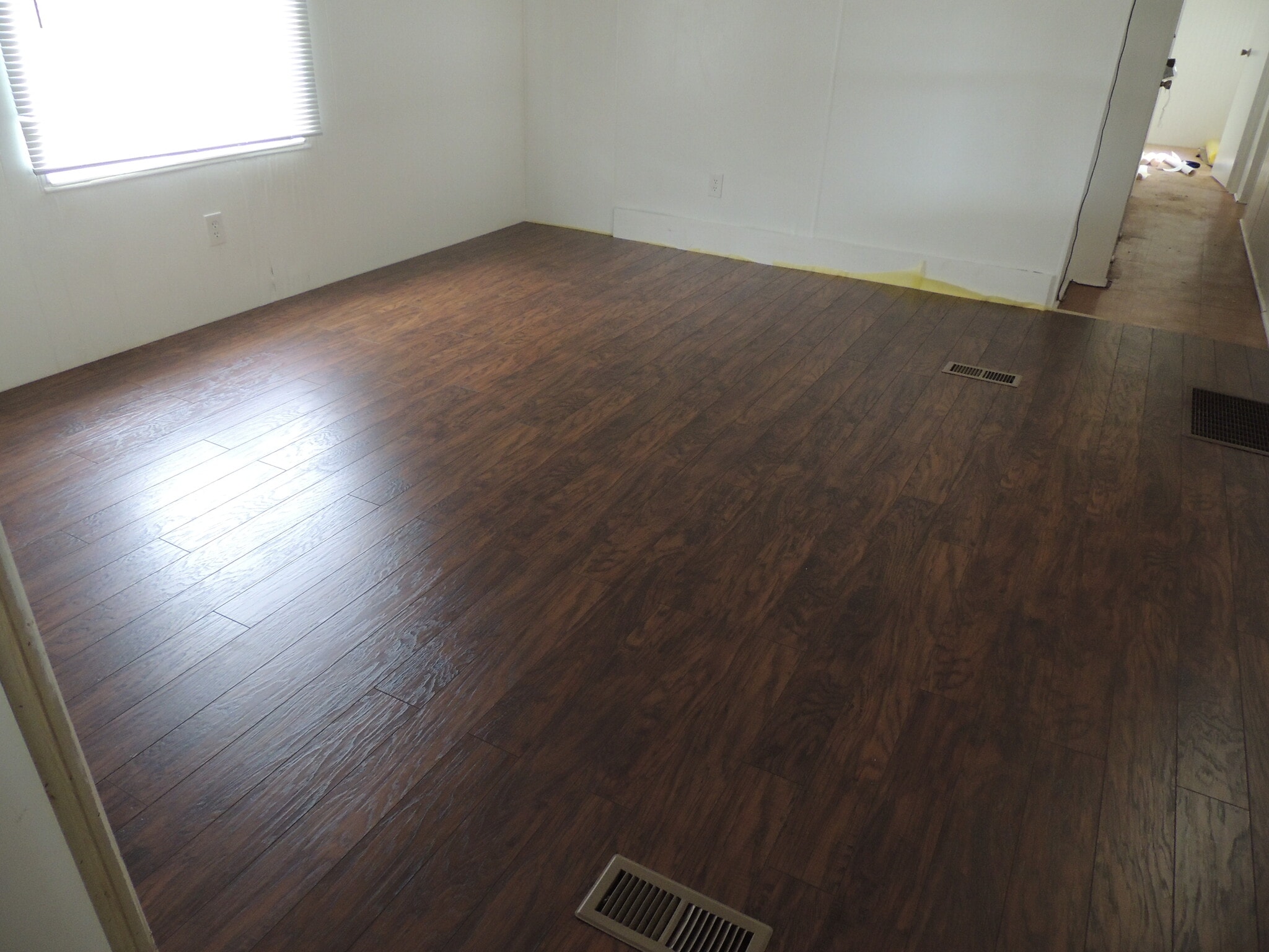 NEW UPSCALE FLOORING IN LIVING ROOM - 7424 Egress Ln