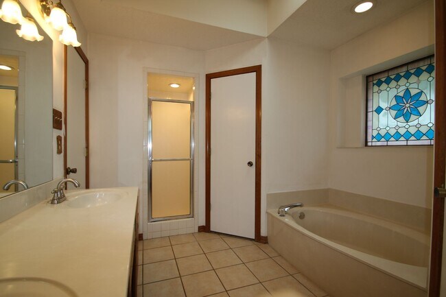 Building Photo - Corner Lot Charmer Off Chapel Creek | 4BR/2BA with Fireplace, Garden Tub & Fenced Backyard