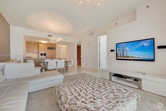 Building Photo - 3 br, 3.5 bath Condo - 15811 Collins Ave A...