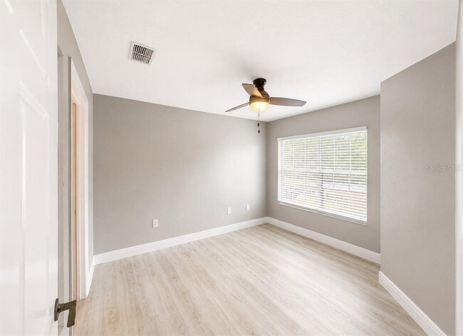 Building Photo - 9160 Lake Chase Island Way