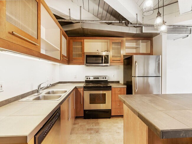 Building Photo - Marshall Wells - North facing Pearl District Loft w/parking/storage/ac