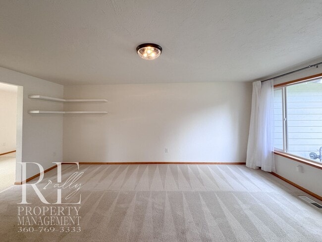 Building Photo - Bright & Spacious Single-Level Home with Dual Living Areas