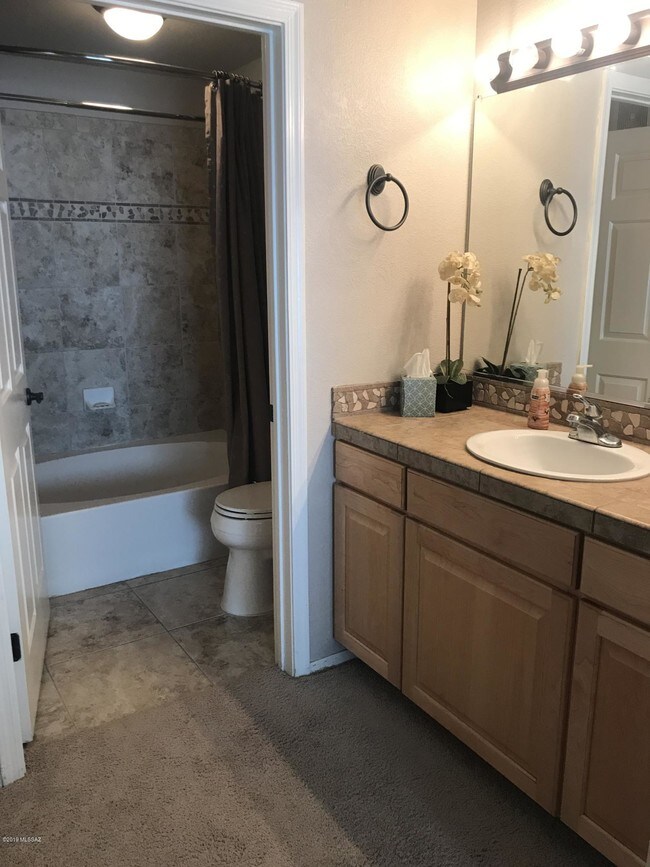 Building Photo - 7050 E Sunrise Dr