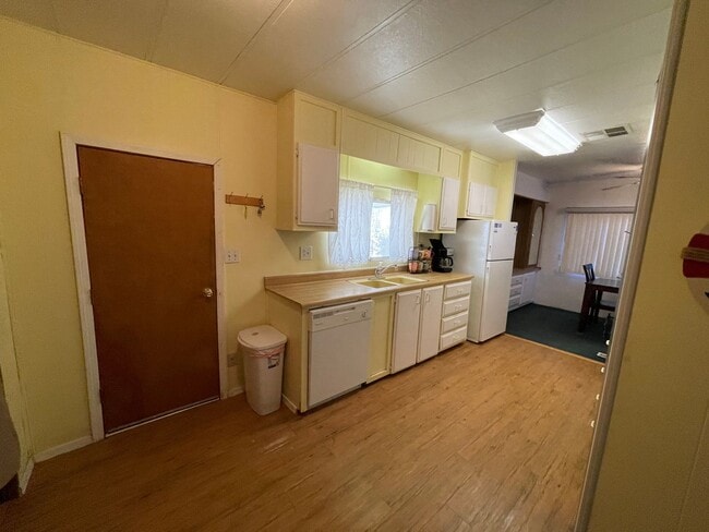 Building Photo - Partially Furnished Manufactured Home on its own Large Corner Lot! *No HOA*