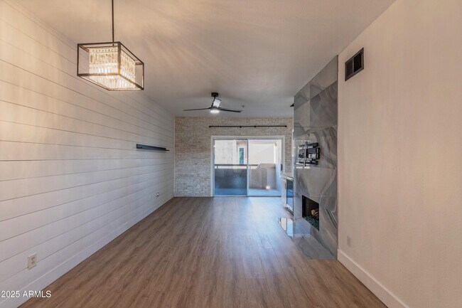 Building Photo - 9450 E Becker Ln