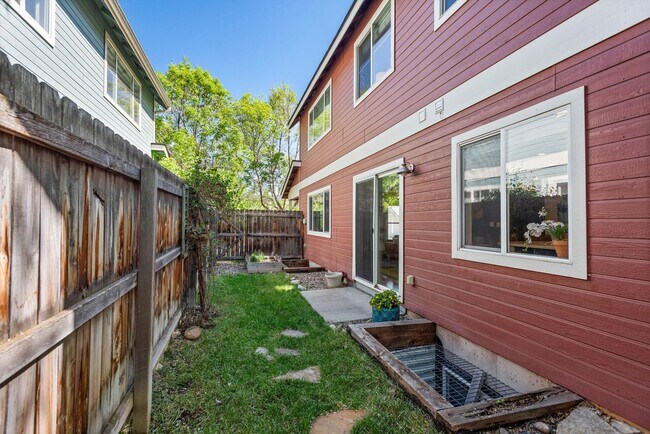 Building Photo - Prime Location | Spacious 4BD Home with El...