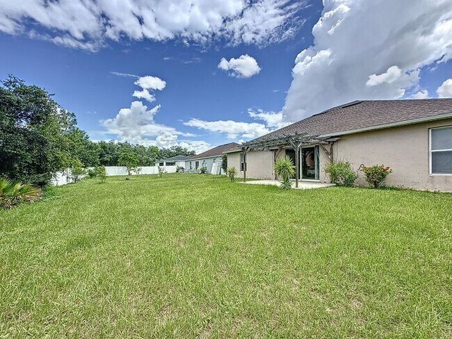 Building Photo - Poinciana single family home in Village 7,...