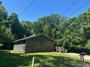 Building Photo - Two Bedroom Cottage Style Home Nestled in ...