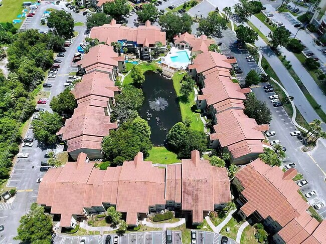 Building Photo - "Charming 2-Bed, 2-Bath Condo Oasis in Kissimmee - 937 Sq Ft of Modern Comfort!"