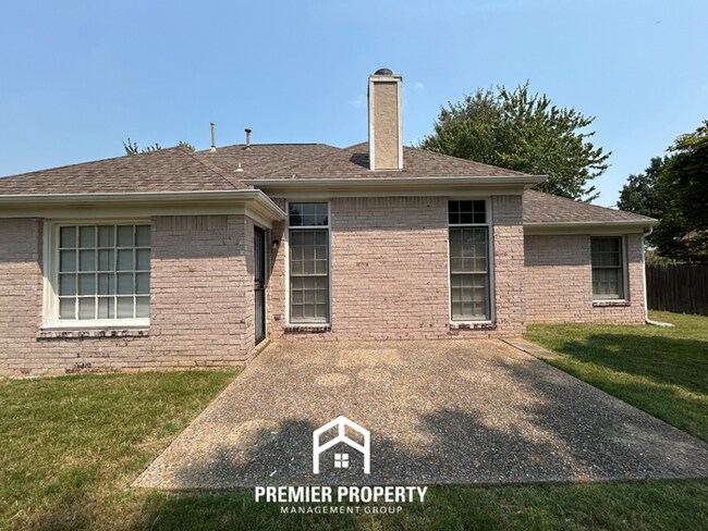 Building Photo - Spacious 3BR/2BA Near Southwind | 1,958 Sq Ft, Brick Fireplace, 2-Car Garage & Quiet Cove