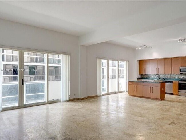 Building Photo - 9499 Collins Ave