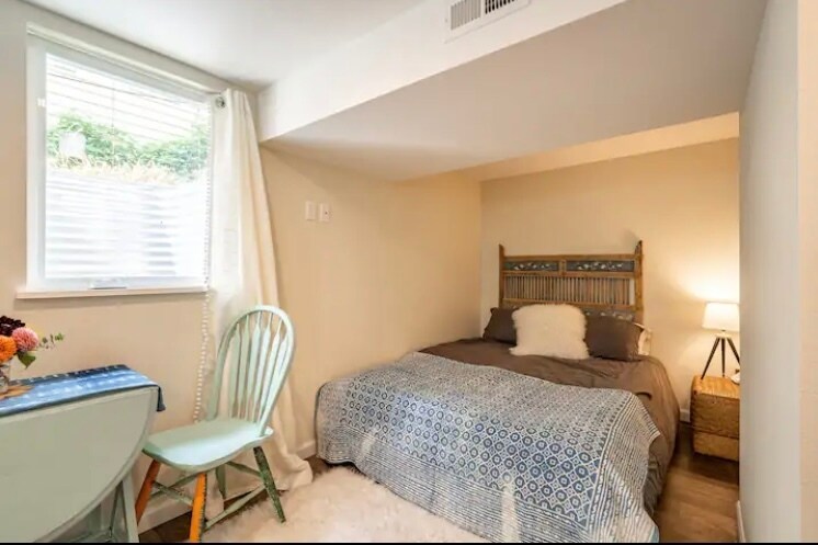 There is now a smart TV mounted to the wall on a swivel so you can enjoy from bed or the kitchenette - 3330 SE Franklin St