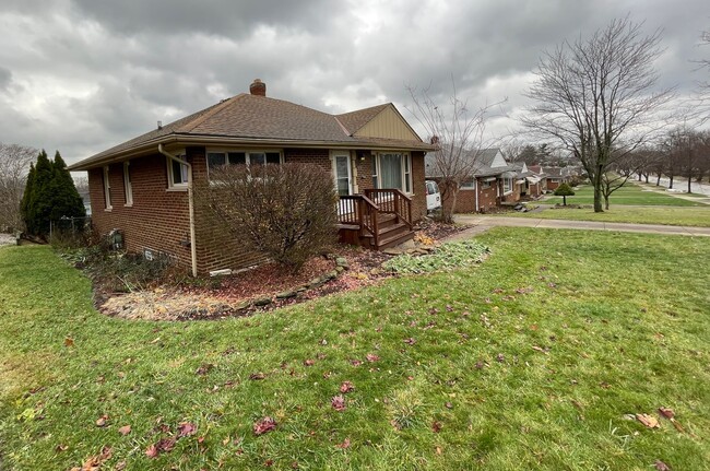 Primary Photo - Ranch Style home with a finished basement