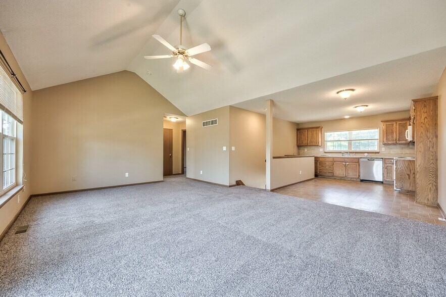 2nd floor living room with vaulted ceiling - 11220 W 61st St