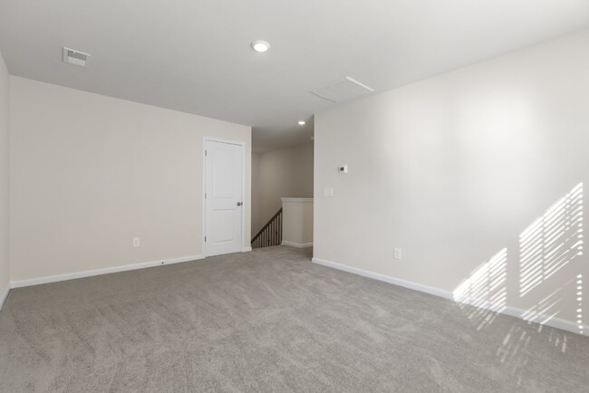 Building Photo - Brand-New 4-Bedroom/3-Full Bathroom Townho...