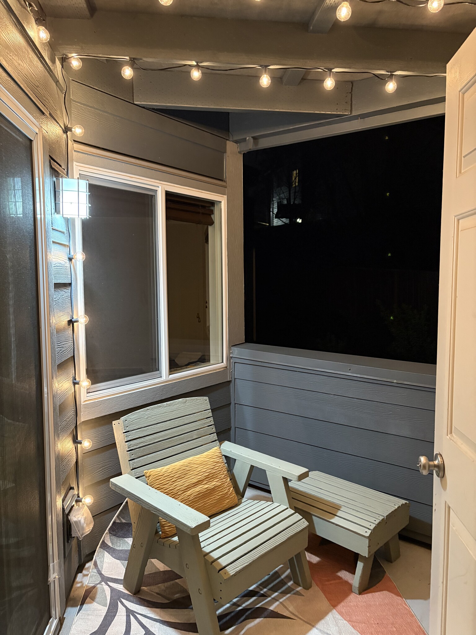 Balcony at night with party lights on - 7929 SW 40th Ave