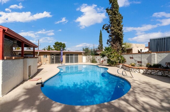 Building Photo - Available March 1, 2026. Updated 2 Bedroom 1.5 Bath Duplex with private dedicated pool.