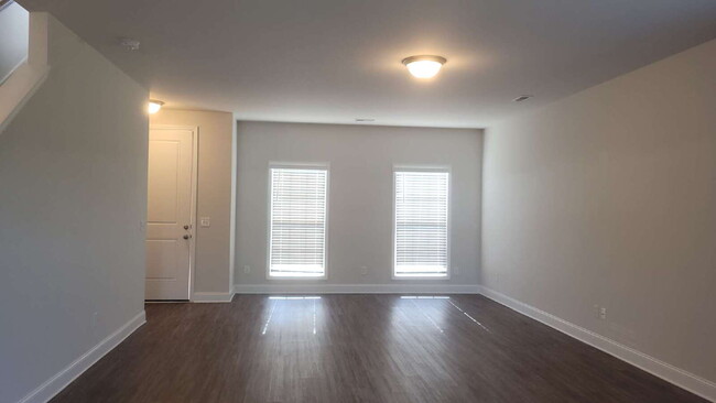 Building Photo - "Spacious 4-Bedroom Retreat with Modern Gr...