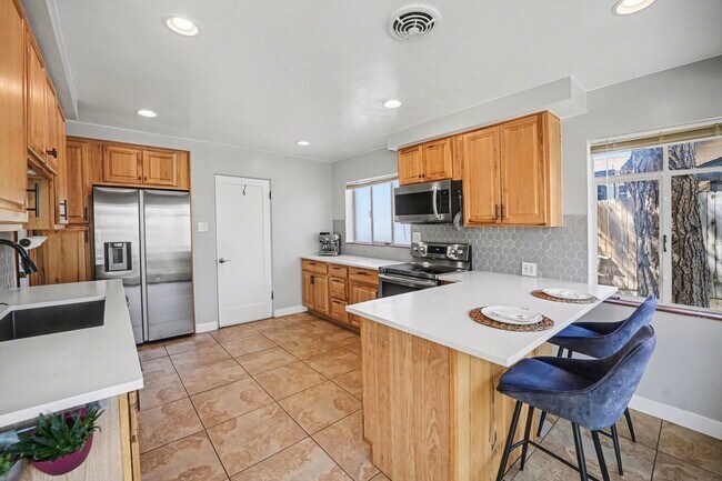 Building Photo - Sunlit Wheat Ridge Gem with Huge Wooded Backyard