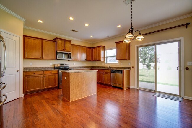 Building Photo - Gorgeous 4/5 BR, 3 BA, 2 Car Garage Home with Fenced Backyard and Large Storage Unit