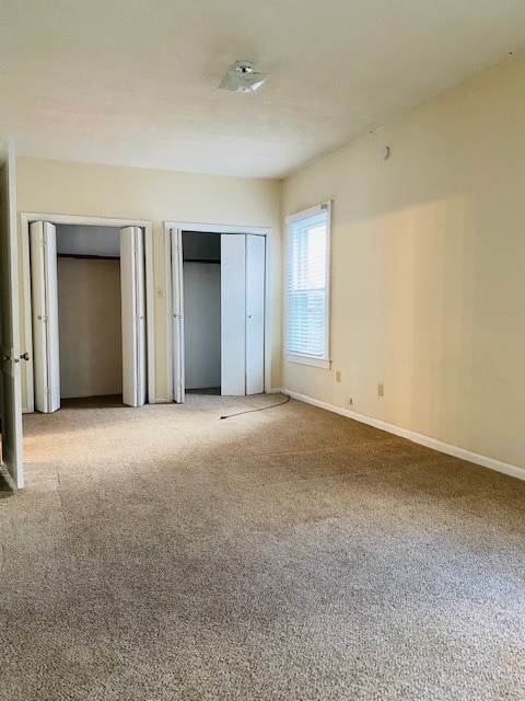 King size bedroom with double closets, carpet has been deep cleaned - 126 Peck Ave