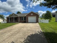 Building Photo - July Only: Submit your application this month and pay a reduced application fee of just $32. Char...