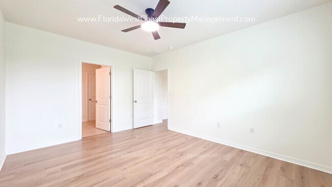 Building Photo - MOVE IN READY ! 4 BEDROOM/2 BATH! TILE- LVP THROUGHOUT! LAWN MOWING INCLUDED!