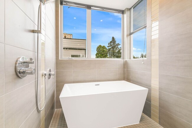 Building Photo - 3 Bedroom Modern Industrial Townhome with City Views & Rooftop Oasis